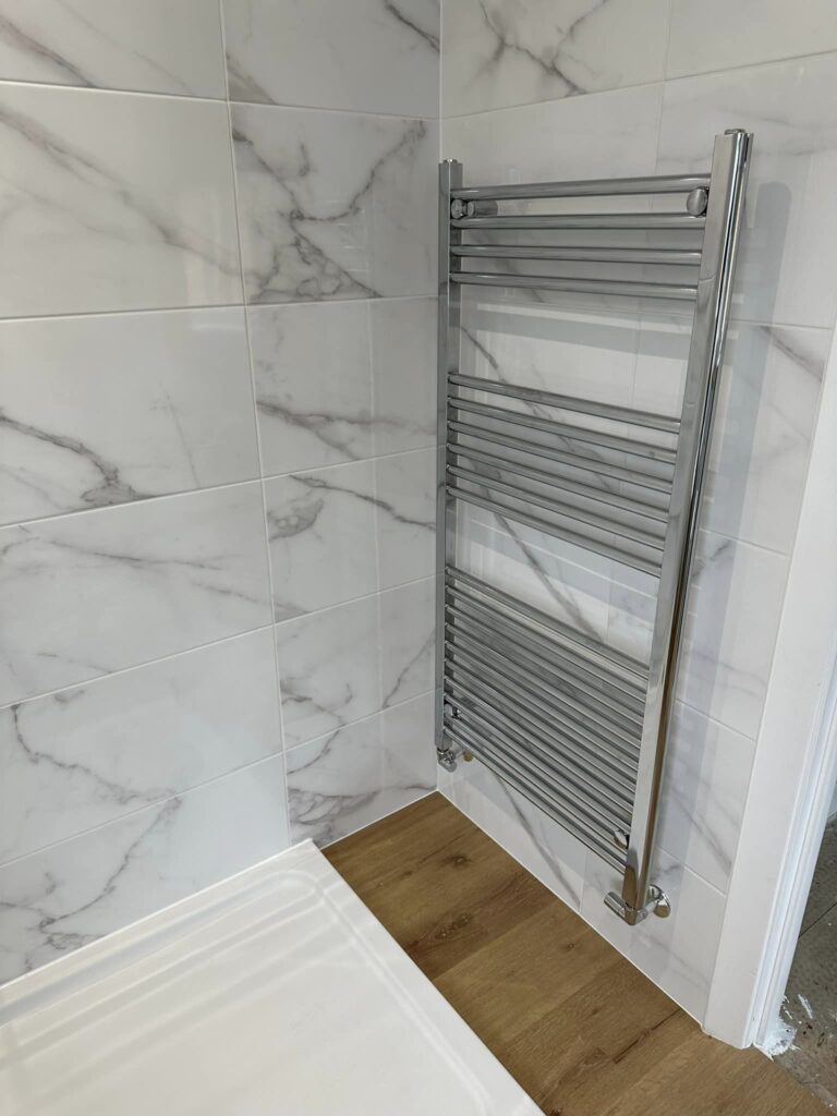A modern bathroom heated towel rail